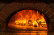 © Mazur Travel - Fire wood burning in the oven