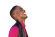 © mimagephotos - African guy laughing against white background
