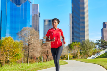 Wall Mural - Runner girl running listening music earphones