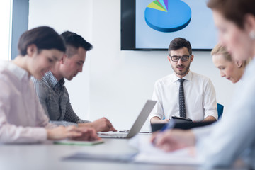 young business people group on team meeting at modern office