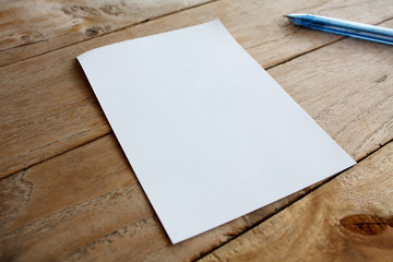 blank paper on wood table