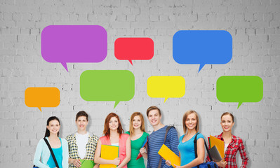 Wall Mural - group of teenage students with folders and bags