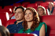 © Syda Productions - happy friends watching movie in theater