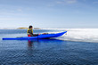 © Johnér - Person kayaking on sea