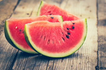 Wall Mural - Fresh watermelon slices on the wooden table 