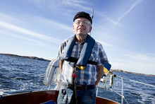 Senior Man On Boat