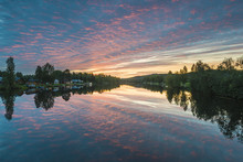 Morning Sky Reflecting On Lake