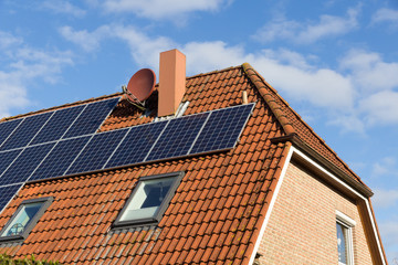 Wall Mural - house with solar panels on the roof