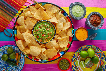 Wall Mural - Nachos with guacamole tortilla chips sombrero