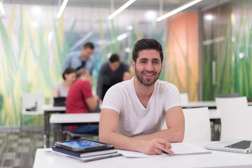 Wall Mural - male student in classroom