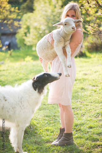 Farm Life Blonde Farmer Woman Playing With Borzoi Dog And Baby Lamb Stock Photo Adobe Stock
