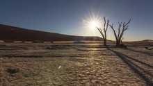 Sunset Time Lapse Sun Going Down Behind A Dead Tree Wide Desert Arid Landscape At Sossusvlei Dead Vlei Namib Desert Namibia Global Warming 4k
