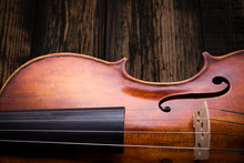 Close View Of A Violin Strings And Bout