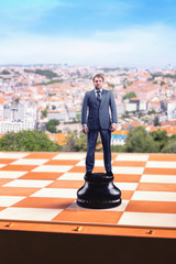 Wall Mural - Businessman on the chess board