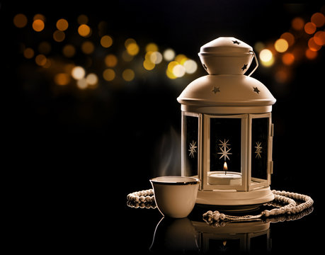 White lantern with Arabian coffee and rosary