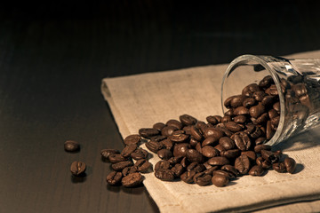 Wall Mural - Coffee beans in a glass