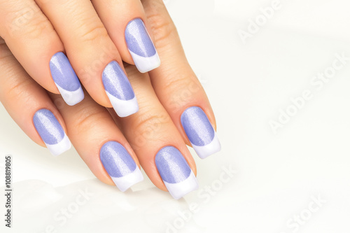 Woman hands with french manicure  close-up Fototapet