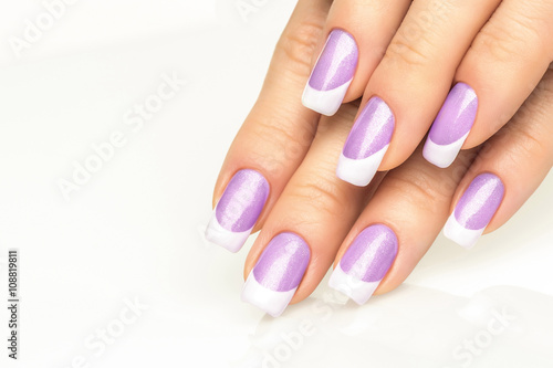 Fotografering Woman hands with french manicure  close-up