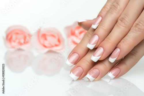 Woman hands with french manicure  close up Billede på lærred