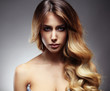 © opolja - Beautiful blonde woman with long, healthy , straight and shiny hair.