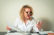 © gmstockstudio - busy business woman having troubles