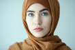 portrait of a young woman eastern type in the modern Muslim clothes and beautiful headdress