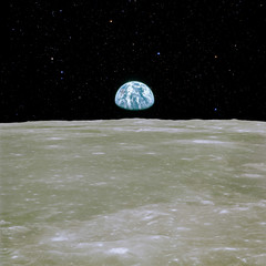 Wall Mural - moon surface with earth view. elements of this image furnished by nasa
