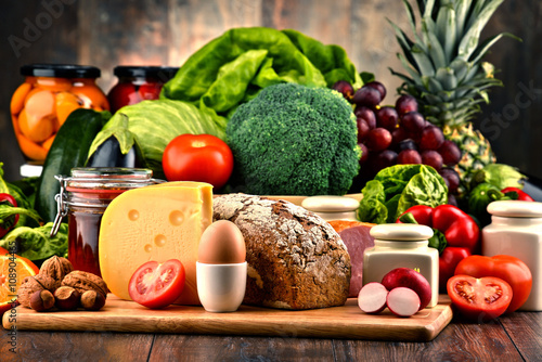 Fototapeta na wymiar Organic food including vegetables fruit bread dairy and meat