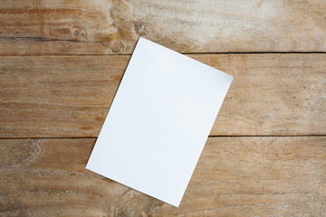 blank paper on wood table