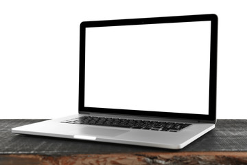 Sticker - Laptop with black screen on wooden table against white background