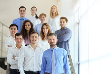 Wall Mural - Group of people standing on the stairs