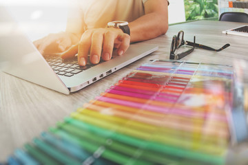 Poster - Website designer working digital tablet and computer laptop with