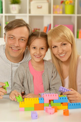 Canvas Print - happy family playing at home