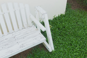 wooden bench seat in home garden