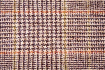 Texture brown plaid wool fabric closeup