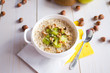 © DariaS - oatmeal with nuts and fruits for breakfast
