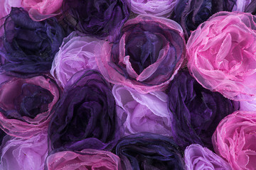 Background of pink and purple blossoms from cloth
