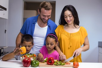 Wall Mural - Happy family in the kitchen