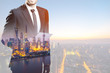 © zhu difeng - double exposure of businessman on background
