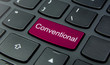 
Business Concept: Close-up the Conventional button on the keyboard and have Magenta color button isolate black keyboard
