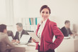 © DragonImages - Happy business woman