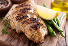Grilled Chicken On A Cutting Board