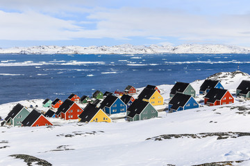 Wall Mural - Colorful inuit houses in a suburb of arctic capital Nuuk