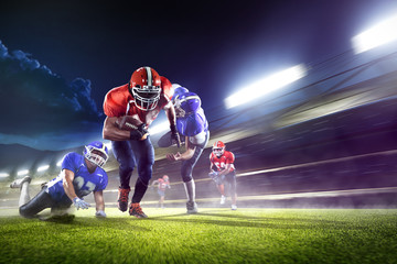 american football players in action on grand arena