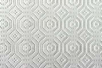 White paper towel.Close-up view of ornamented paper napkin  texture background.