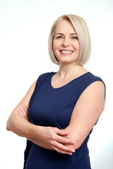 Wall Mural - friendly smiling middle-aged business woman isolated on white background