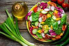 Fresh Vegetable Salad On Wooden Background