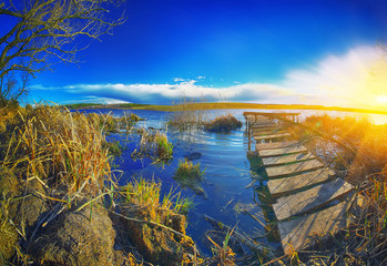 Wall Mural - docks on the lake at sunset