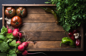 Wall Mural - Fresh raw ingredients for healthy cooking or salad making on rustic wooden background, top view, copy space. Diet, vegetarian food concept.