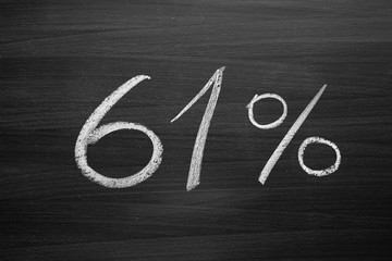 Wall Mural - 61 percent header written with a chalk on the blackboard